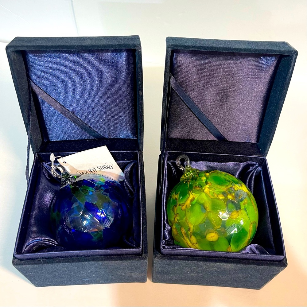 2 blown glass ornaments. Glass eye studio Seattle Mount Saint Helens, blue green